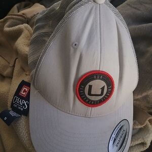 Huk light gray and red performance fishing trucker cap